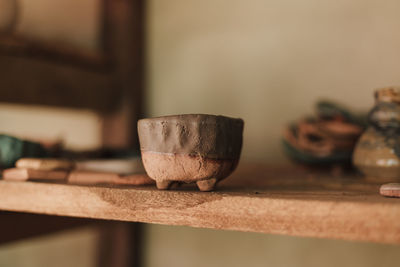 Close-up of old tea light on table