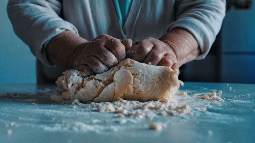 Close-up of person preparing food