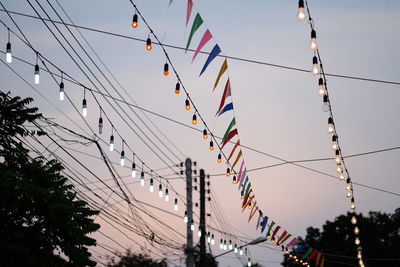 Low angle view of cables against clear sky