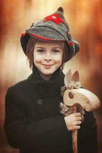 Portrait of smiling girl wearing hat