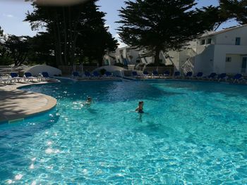 People swimming in pool