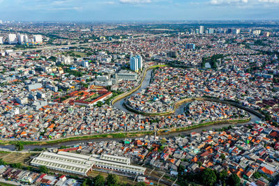 High angle view of cityscape jakarta and ciliwung river   