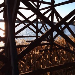 Low angle view of metallic structure against sky