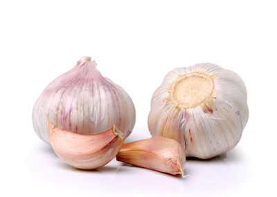 Close-up of pumpkins against white background