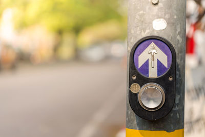 Close-up of information sign on road