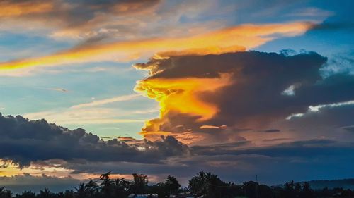 Low angle view of dramatic sky during sunset