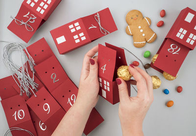 High angle view of hand holding cookies
