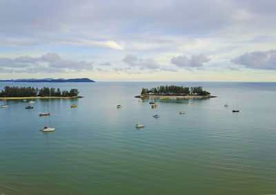 Aerial view  of sea against sky with yacht at langkawi island