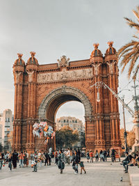 Group of people in front of historical building