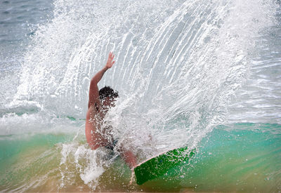 Man surfing in sea