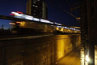 Light trails on bridge at night