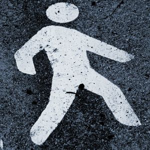 High angle view of arrow symbol on road