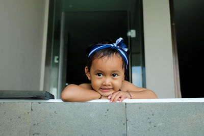 Portrait of cute girl at home