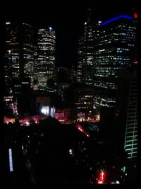 Illuminated cityscape at night