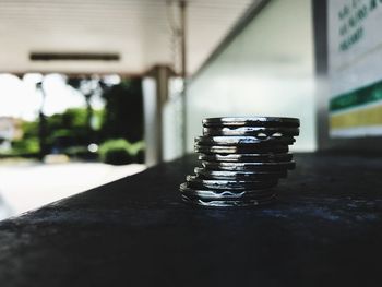 Close-up of metal stack on table