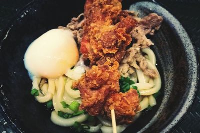 Close-up of served food in plate