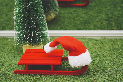 Low section of woman sitting on grass