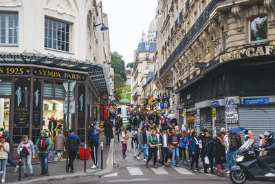 People walking on city street
