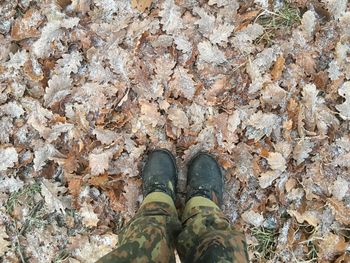 Low section of person standing on ground