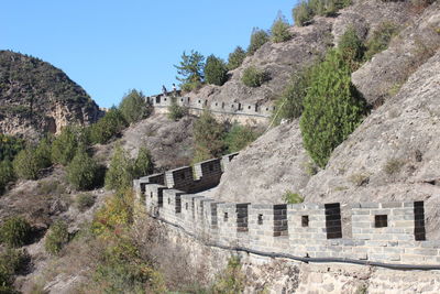 View of stone wall against the sky