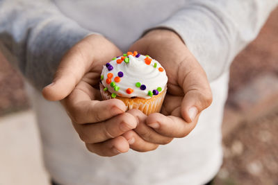 Close-up of person holding ice cream