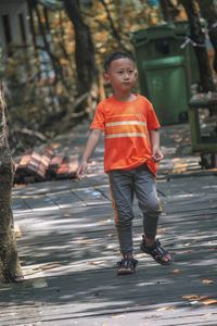 Full length of boy walking outdoors