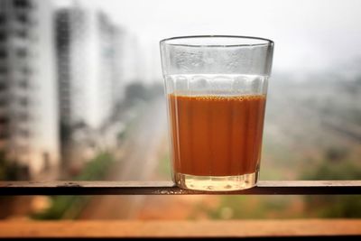 Close-up of tea in glass on table