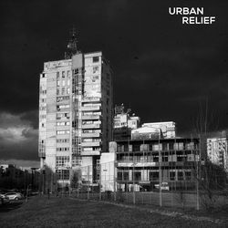 Buildings in city against sky