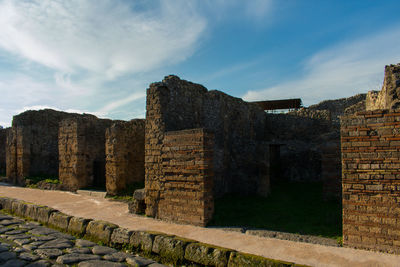 Old ruin building against cloudy sky