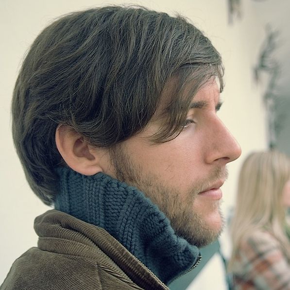 headshot, young adult, person, lifestyles, portrait, front view, looking at camera, focus on foreground, head and shoulders, casual clothing, young men, close-up, leisure activity, smiling, mid adult, contemplation, warm clothing