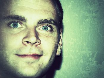 Close-up portrait of smiling young woman