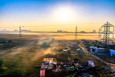 High angle view of city at sunset