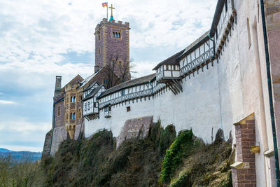 Low angle view of old building against sky