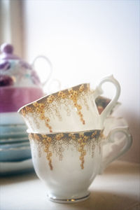 Close-up of coffee cup on table