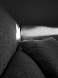 Close-up of sofa in illuminated room