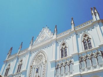 Low angle view of cathedral against blue sky