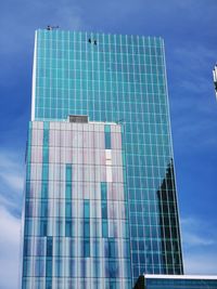 Low angle view of modern building against sky