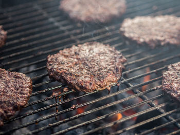 Close-up of meat on barbecue grill