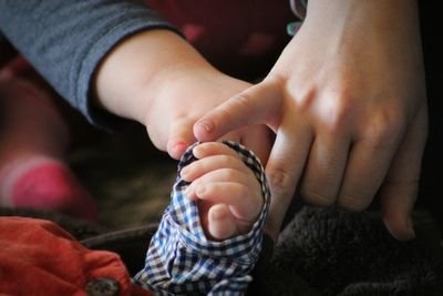 Close-of children and baby's hands