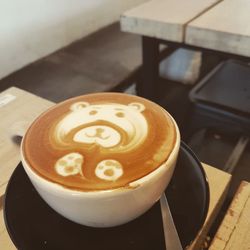 Close-up of cappuccino on table