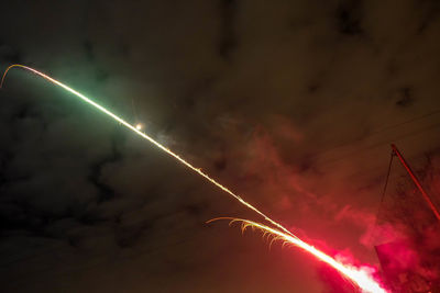 Low angle view of vapor trails in sky