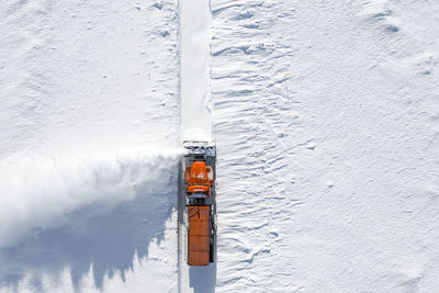 High angle view of snow on frozen boat