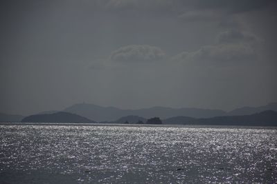 Scenic view of sea against sky at night