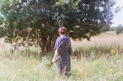Full length of man standing on field