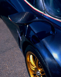 Close-up of illuminated car on road at night