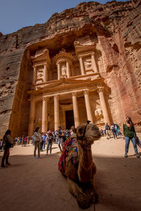 Group of people in front of historical building