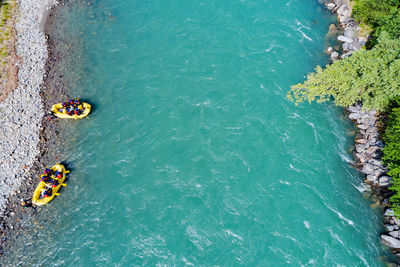 High angle view of people in sea