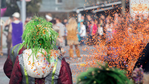 View of people on street during carnival