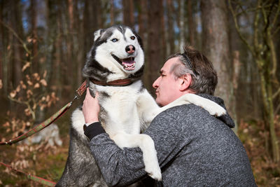 Portrait of woman with dog