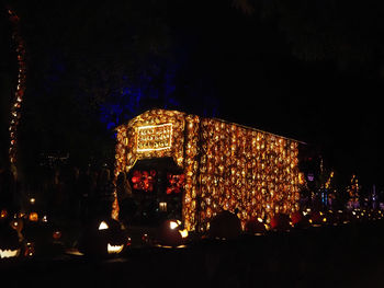 Illuminated christmas tree at night